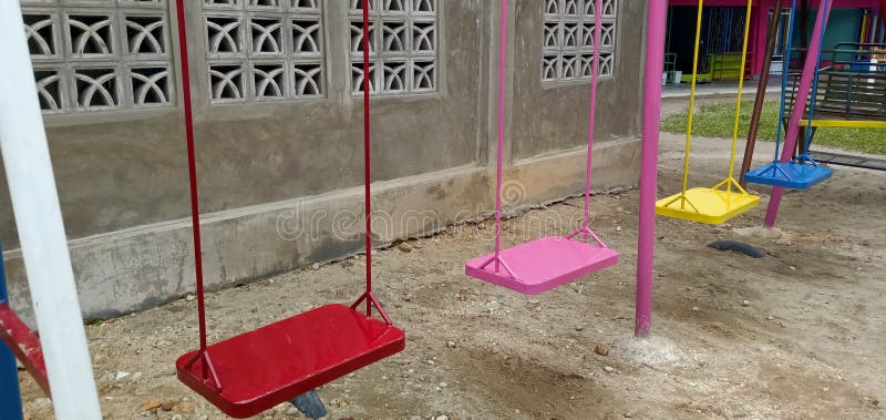 Colorful Swings in Children& X27;s School. Stock Photo - Image of ...