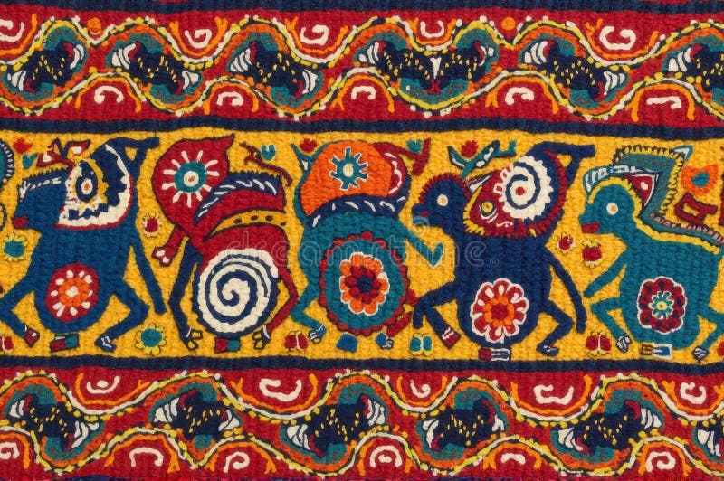 Colorful traditional folk art textile with abstract animal patterns stock photo