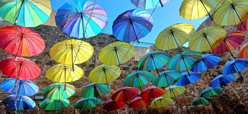 Colorful transparent umbrellas in the old city of Bizerte royalty free stock photo