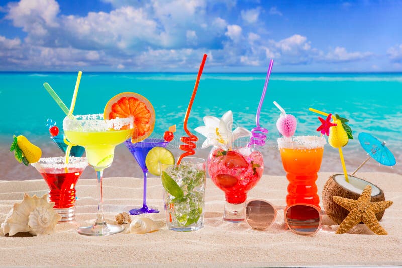 Colorful Tropical Cocktails at Beach on White Sand Stock Photo - Image