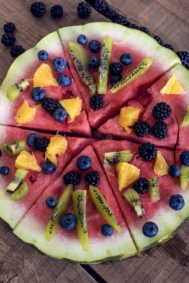 Colorful tropical fruit watermelon pizza