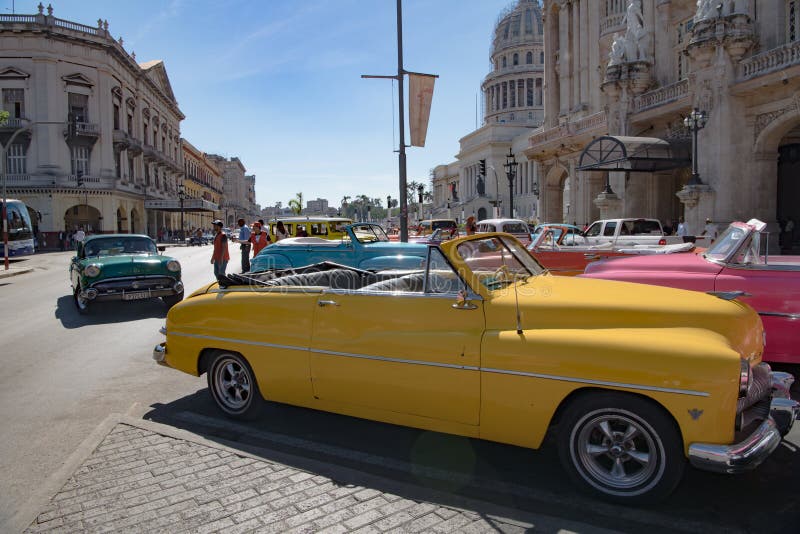 Colorful vintage classic cars in front of Grand Theatre Havana, Cuba royalty free stock photos Colorful vintage classic cars in front of Grand Theatre Havana, Cuba royalty free stock photos