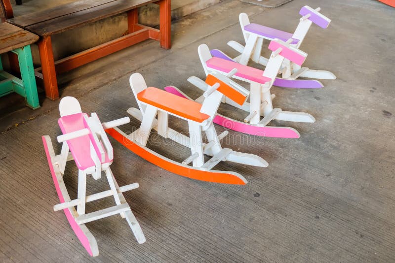 Colorful vintage rocking horse wooden chair for children could e royalty free stock photo Colorful vintage rocking horse wooden chair for children could e royalty free stock photo