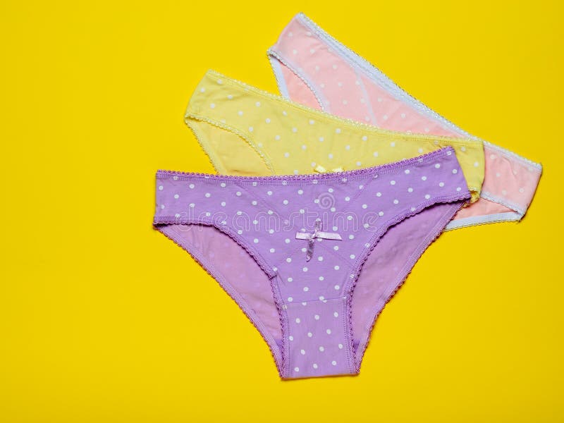 Wet Spot Panty Colorful Women`s Panties Stacked on a Yellow Background. Fashionable Concept Stock Image - Image of pants, accessory: 140850519