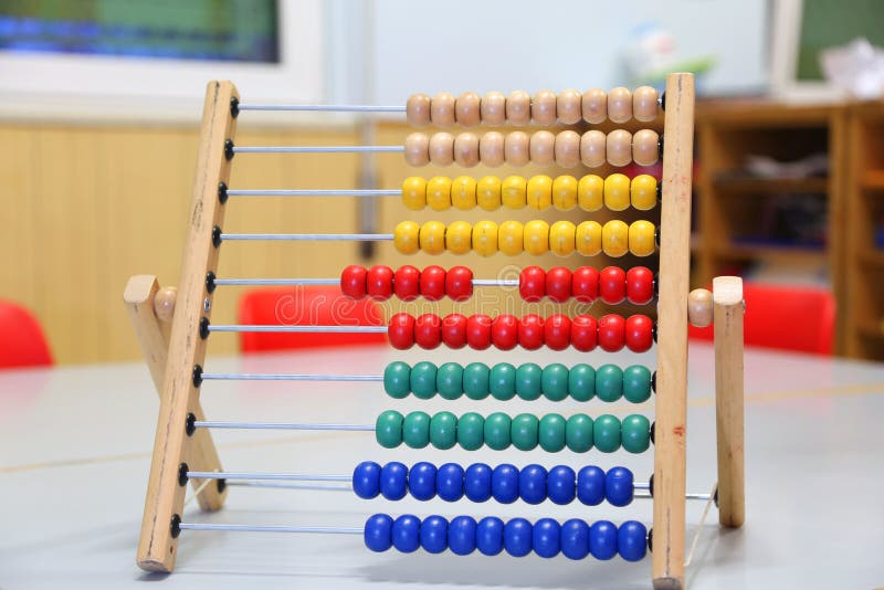 Colorful Wooden Abacus Used by School Children To Learn How To C Stock