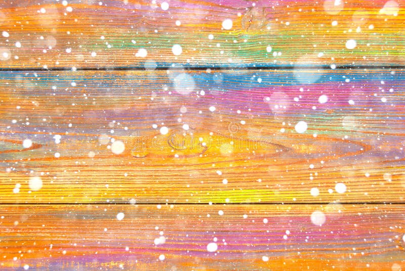 Colorful wooden background and falling snowflakes. Winter background. Christmas spirit royalty free stock photos Colorful wooden background and falling snowflakes. Winter background. Christmas spirit royalty free stock photos