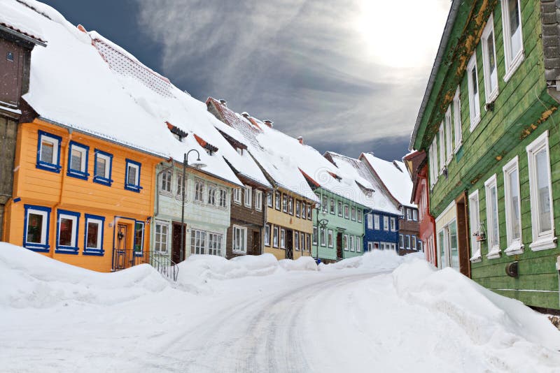 Colorful wooden houses snowed in Sankt Andreasberg, Harz Germany