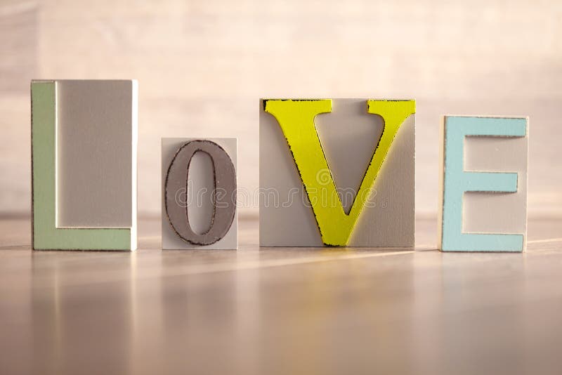 Colorful wooden letters love stock photography