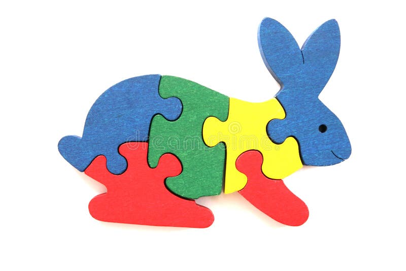Colorful wooden rabbit puzzle stock image