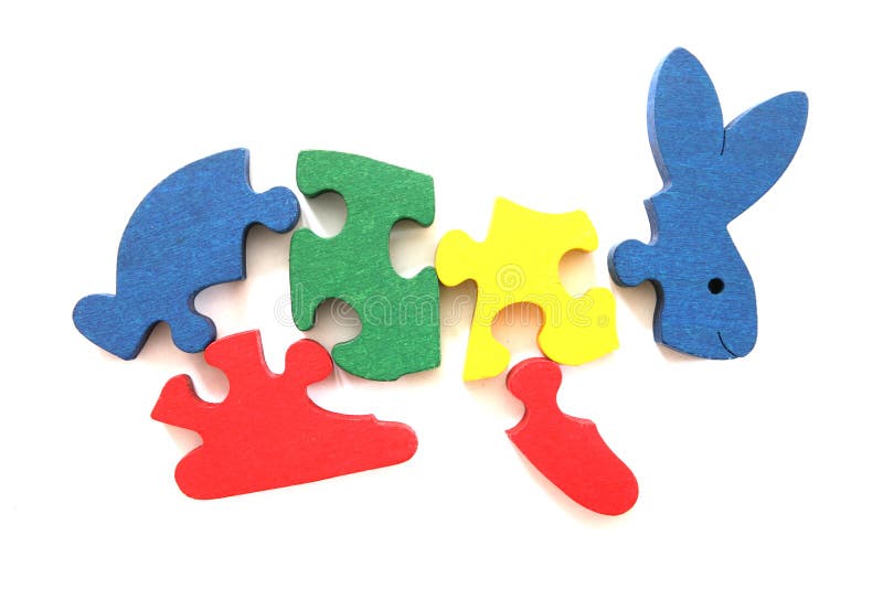 Colorful wooden rabbit puzzle toy stock photos