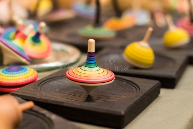 Colorful wooden spinning top royalty free stock photos