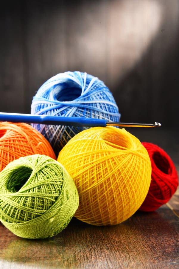 Colorful Yarn for Crocheting and Hook on Wooden Table Stock Image