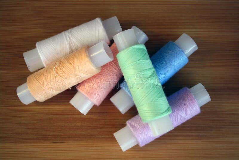 Colorful Yarn on Spool Cotton. Colorful Sewing Threads on White