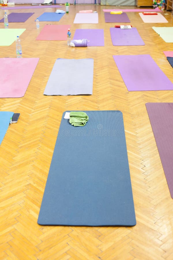 Colorful yoga mats stock photo. Image of education, indoor 50747622