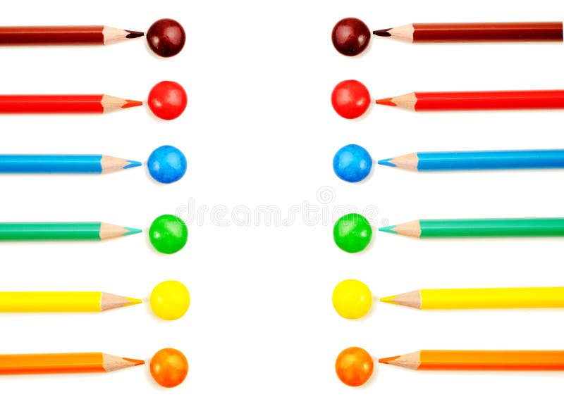 Row Of Bright Crayolas Pointing Downwards On White Stock Photo