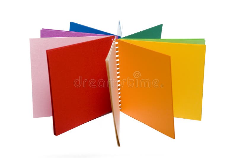Creioane colorate și blocnotes colorat stock photography