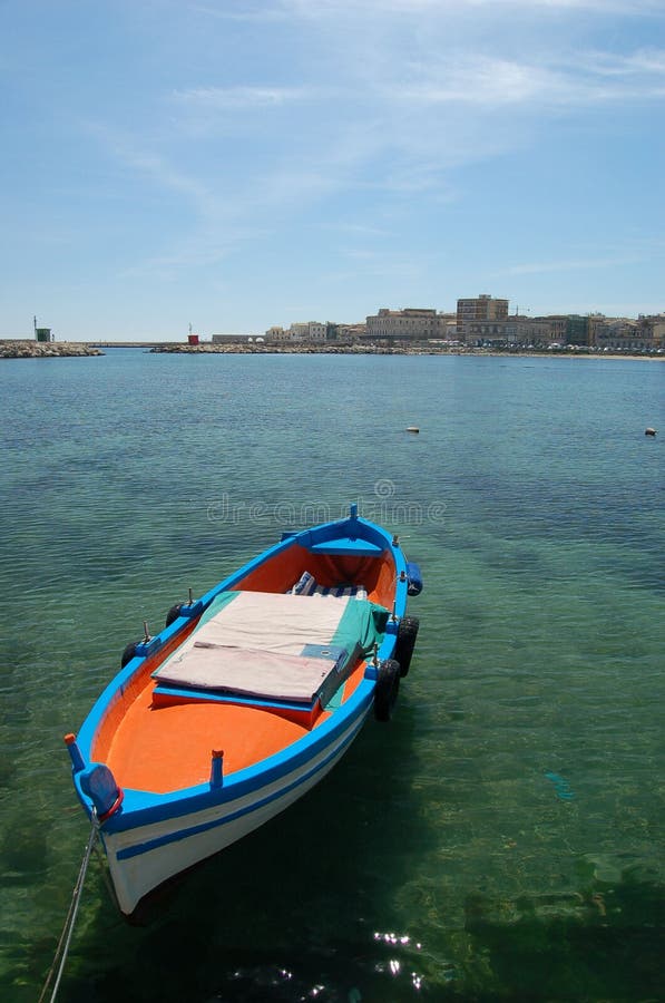 A coloured fishing boat ...