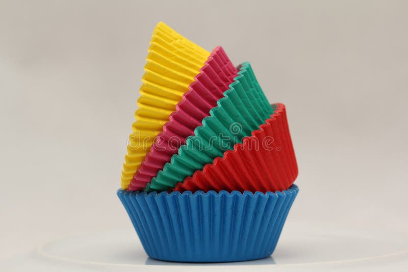 Coloured Paper Pans Baking Cups for Cupcakes and Muffins Stock Photo