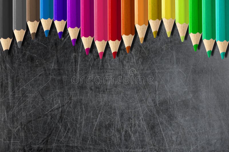 coloured pencils forming wave border blank blackboard or chalkboard