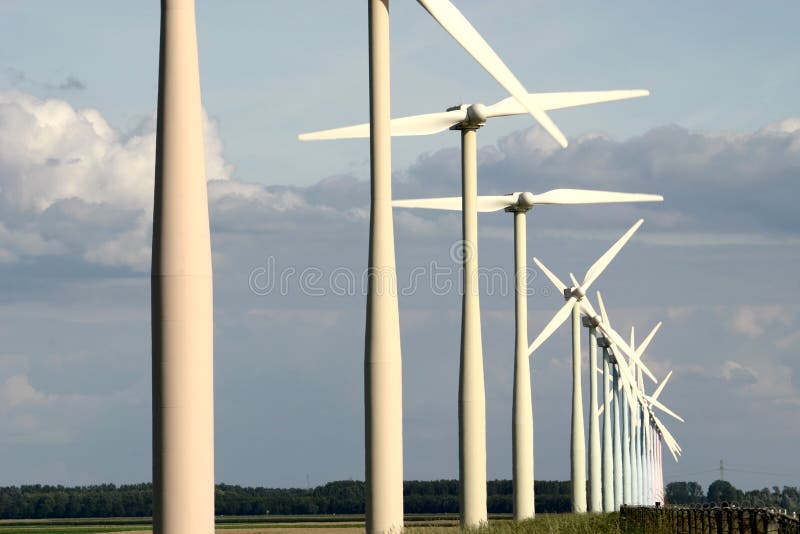 Coloured wind turbines in a row