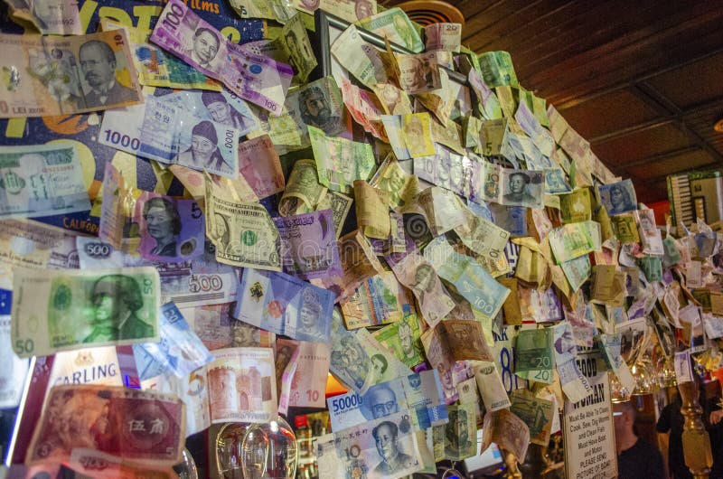 Colourful collection of multiple currency from different country with symbol and pictures on the notes stock images Colourful collection of multiple currency from different country with symbol and pictures on the notes stock images