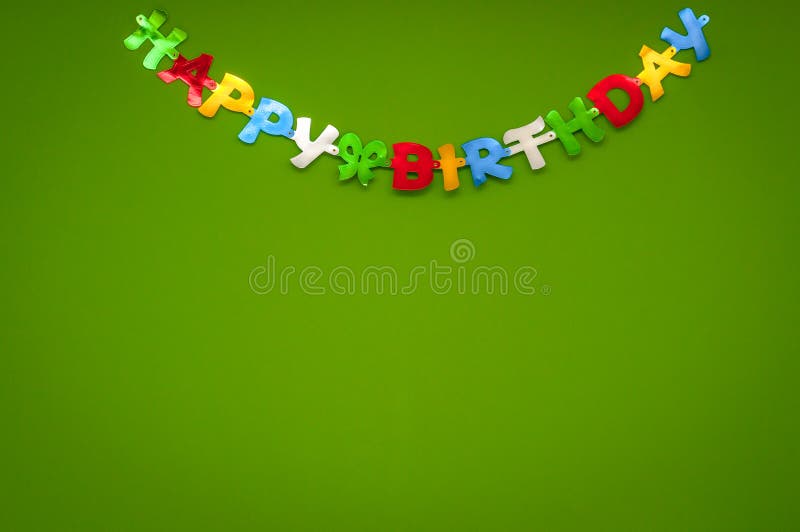 Colourful Happy Birthday Greeting Banner on a Green Wall in a Celebration  and Party Concept. Stock Photo - Image of inscription, cartoon: 110379814