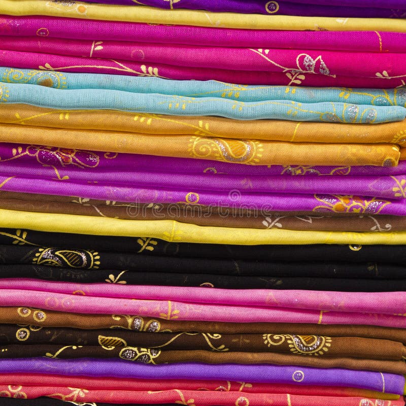 Colourful Silk Cloth stacked for sale in market