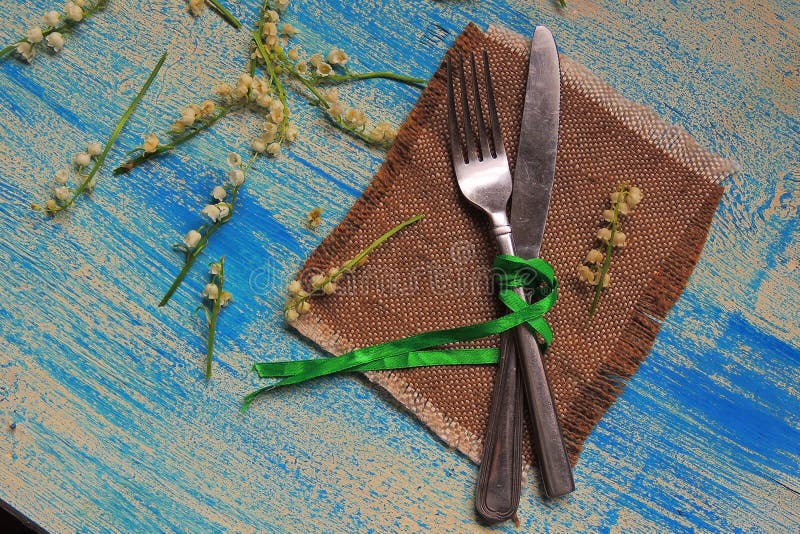 Coltelleria e mughetti immagine stock libera da diritti