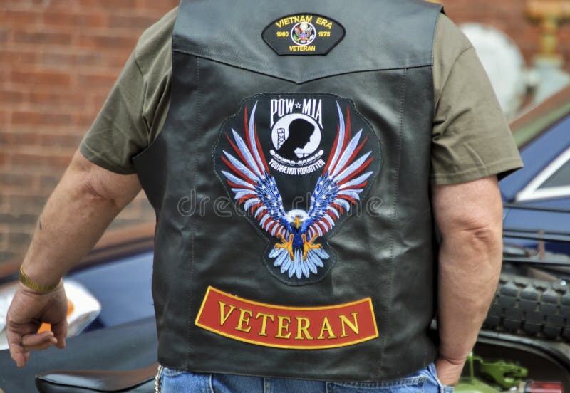 Combat Veteran Wears Leather Vest with Patches Editorial Image