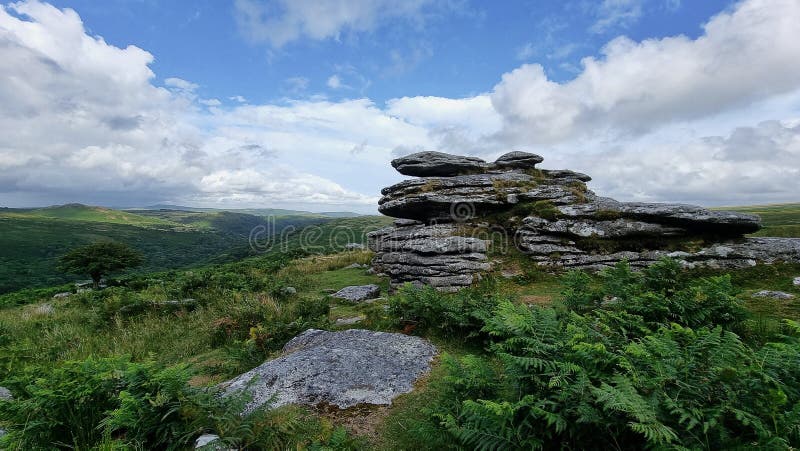 Combestone TorDARTMOOR NATIONAL PARK DEVON UK Comberstone Tor, Cumston Tor, Combeston Tor, Cumsdon Tor, Combstone Tor, Combstone Rock, This stunning tor, with long views of the River Dart, is also one of the most accessible on Dartmoor, having its own car park just a few metres away. The summit rocks present as an avenue with at least three distinct outcrops that stud the gentle spur of Cumston Tor Hill, on the far north-west flank of Holne Moor. The local pronunciation of the tor, hill and nearby farm is Cumston&. Combestone TorDARTMOOR NATIONAL PARK DEVON UK Comberstone Tor, Cumston Tor, Combeston Tor, Cumsdon Tor, Combstone Tor, Combstone Rock, This stunning tor, with long views of the River Dart, is also one of the most accessible on Dartmoor, having its own car park just a few metres away. The summit rocks present as an avenue with at least three distinct outcrops that stud the gentle spur of Cumston Tor Hill, on the far north-west flank of Holne Moor. The local pronunciation of the tor, hill and nearby farm is Cumston&