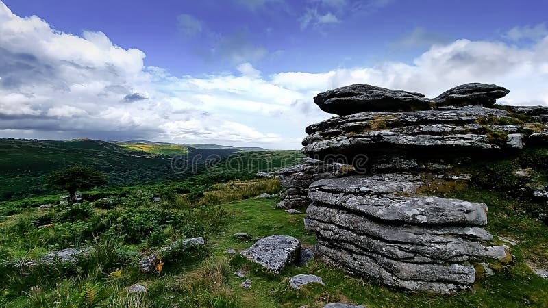 Combestone TorDARTMOOR NATIONAL PARK DEVON UK Comberstone Tor, Cumston Tor, Combeston Tor, Cumsdon Tor, Combstone Tor, Combstone Rock, This stunning tor, with long views of the River Dart, is also one of the most accessible on Dartmoor, having its own car park just a few metres away. The summit rocks present as an avenue with at least three distinct outcrops that stud the gentle spur of Cumston Tor Hill, on the far north-west flank of Holne Moor. The local pronunciation of the tor, hill and nearby farm is Cumston. Combestone TorDARTMOOR NATIONAL PARK DEVON UK Comberstone Tor, Cumston Tor, Combeston Tor, Cumsdon Tor, Combstone Tor, Combstone Rock, This stunning tor, with long views of the River Dart, is also one of the most accessible on Dartmoor, having its own car park just a few metres away. The summit rocks present as an avenue with at least three distinct outcrops that stud the gentle spur of Cumston Tor Hill, on the far north-west flank of Holne Moor. The local pronunciation of the tor, hill and nearby farm is Cumston