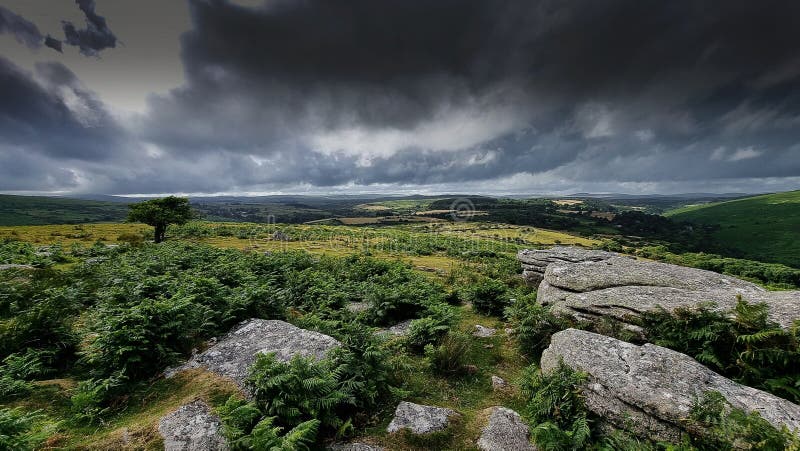 Combestone TorDARTMOOR NATIONAL PARK DEVON UK Comberstone Tor, Cumston Tor, Combeston Tor, Cumsdon Tor, Combstone Tor, Combstone Rock, This stunning tor, with long views of the River Dart, is also one of the most accessible on Dartmoor, having its own car park just a few metres away. The summit rocks present as an avenue with at least three distinct outcrops that stud the gentle spur of Cumston Tor Hill, on the far north-west flank of Holne Moor. The local pronunciation of the tor, hill and nearby farm is Cumston. Combestone TorDARTMOOR NATIONAL PARK DEVON UK Comberstone Tor, Cumston Tor, Combeston Tor, Cumsdon Tor, Combstone Tor, Combstone Rock, This stunning tor, with long views of the River Dart, is also one of the most accessible on Dartmoor, having its own car park just a few metres away. The summit rocks present as an avenue with at least three distinct outcrops that stud the gentle spur of Cumston Tor Hill, on the far north-west flank of Holne Moor. The local pronunciation of the tor, hill and nearby farm is Cumston