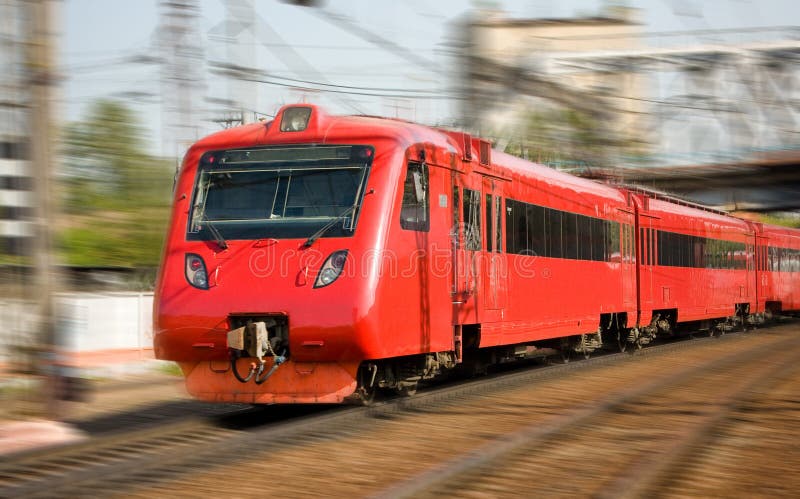 Red high-speed passenger train in motion. Red high-speed passenger train in motion