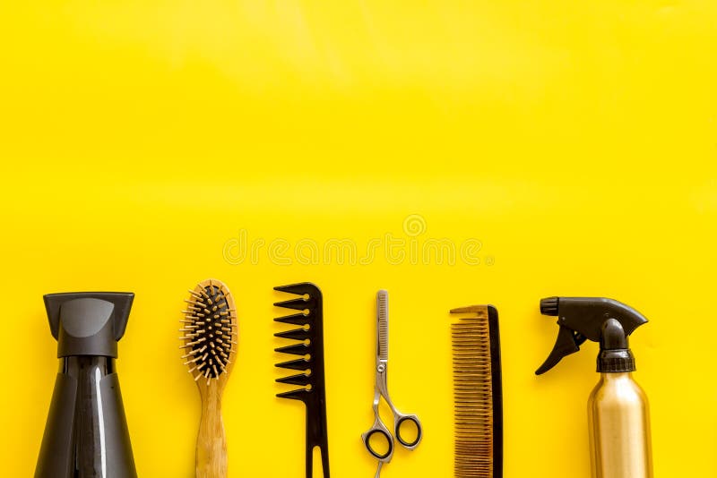 Combs, Sciccors and Hairdresser Tools in Beauty Salon Work Desk on Yellow  Background Top View Space for Text Stock Image - Image of styling, clip:  150461899