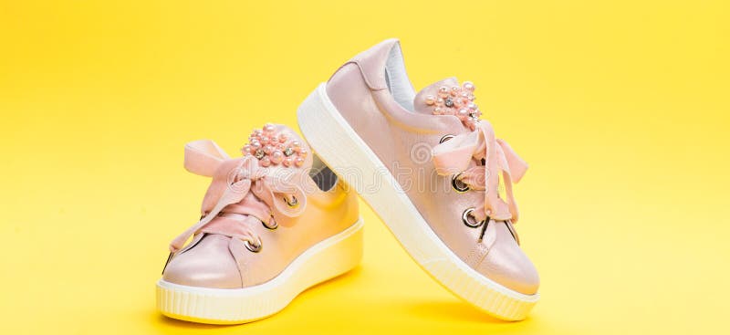 Comfortable Footwear Concept. Cute Shoes on Yellow Background Stock ...