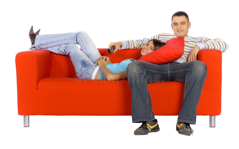 Comfortable Man And Woman On Orange Couch With Remote