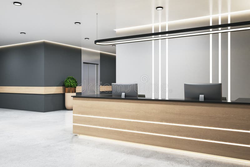 Comfortable Office Hall with Wooden Reception Desk and Elevator Stock