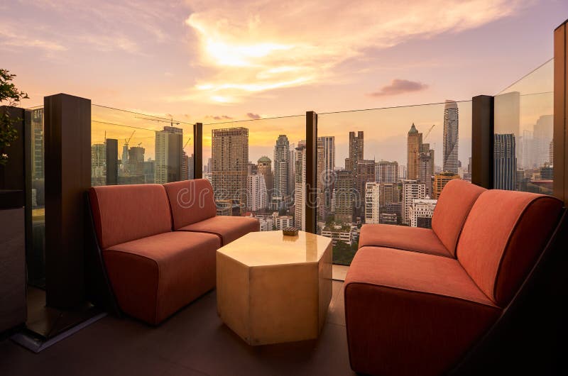 Comfortable Sofa Unit on Rooftop Bar and Restaurant Area Stock Photo