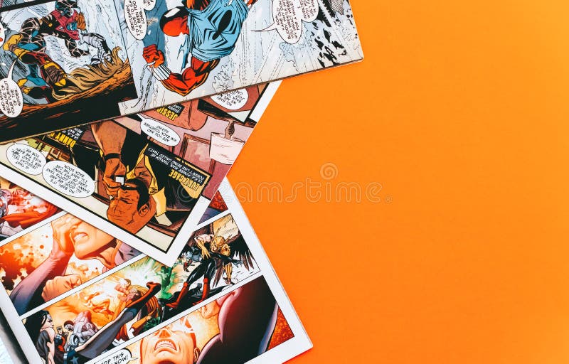 Comic books with copy space on orange background