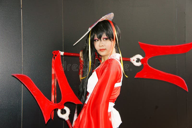 Comic character, Asian cosplayer. HO CHI MINH CITY, VIET NAM- DEC 7: Asian girl transformed into beautiful comic character, Vietnamese cosplayer in amazing cloth stock photography Comic character, Asian cosplayer. HO CHI MINH CITY, VIET NAM- DEC 7: Asian girl transformed into beautiful comic character, Vietnamese cosplayer in amazing cloth stock photography