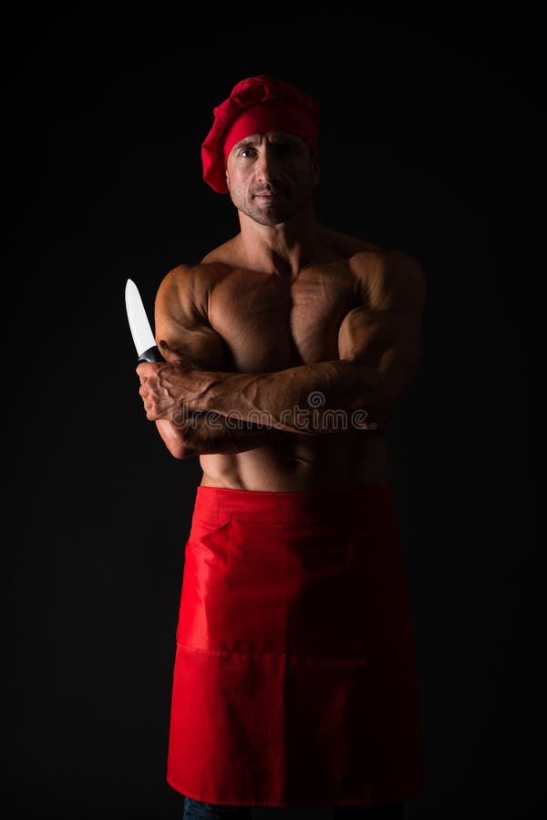 Comida sana para el buen cuerpo carnicero brutal Aditivos alimenticios cocinero atractivo del hombre aislado en negro Carnicero c foto de archivo Comida sana para el buen cuerpo carnicero brutal Aditivos alimenticios cocinero atractivo del hombre aislado en negro Carnicero c foto de archivo