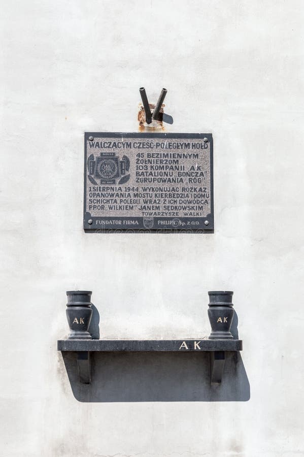 Commemorative plaque to the fallen soldiers of the 103 Polish Home Army company at Slasko-Dabrowski bridge. stock photos Commemorative plaque to the fallen soldiers of the 103 Polish Home Army company at Slasko-Dabrowski bridge. stock photos