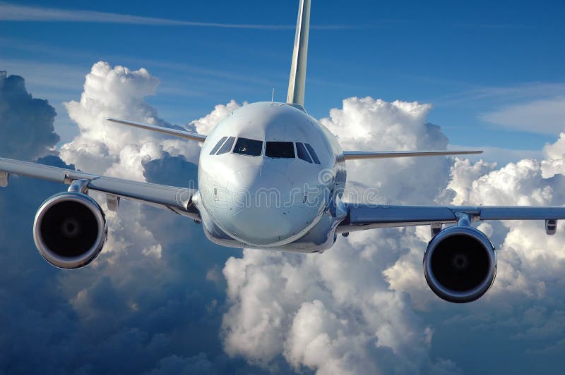 Commercial Airliner in Flight royalty free stock photography