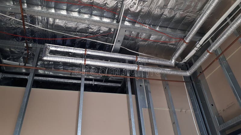 Modern Australian Commercial building construction under Building code of Australia National Construction Code detailing fire safety measures, structural steel beams and posts, flashing wiring, plumbing, warning systems, insulation, and partition walls. Load structural stock images, royalty-free photos and pictures