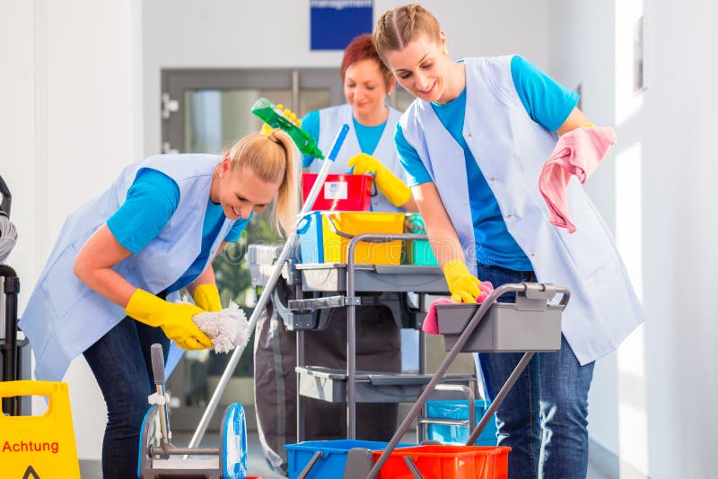 Commercial cleaners doing the job together