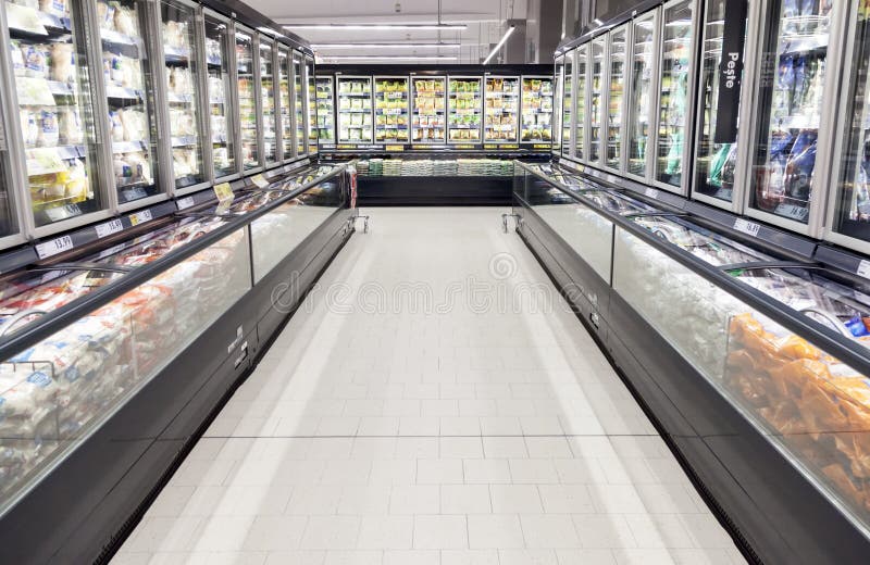 Commercial refrigerators in a large supermarket stock image Commercial refrigerators in a large supermarket stock image