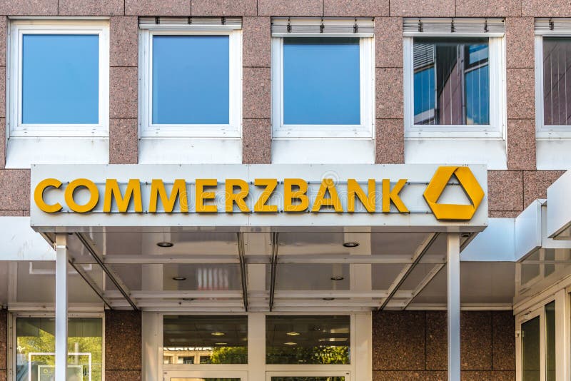 GIESSEN, GERMANY - 2021_04_09: Commerzbank Logo on a Facade. Commerzbank AG is one of the largest banks in Germany, it is active in commercial banking, retail banking and mortgaging. GIESSEN, GERMANY - 2021_04_09: Commerzbank Logo on a Facade. Commerzbank AG is one of the largest banks in Germany, it is active in commercial banking, retail banking and mortgaging