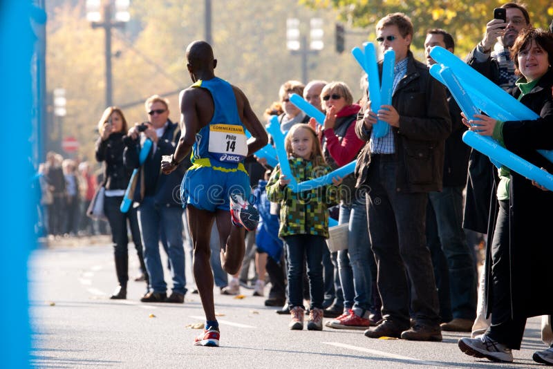 FRANKFURT - OCTOBER 31 - Sanga Philip running at Commerzbank Franfkurt Marathon. October, the 31st, 2010 in Frankfurt, Germany. FRANKFURT - OCTOBER 31 - Sanga Philip running at Commerzbank Franfkurt Marathon. October, the 31st, 2010 in Frankfurt, Germany.