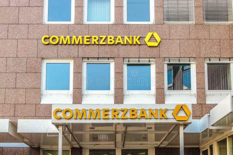 GIESSEN, GERMANY - 2021_04_09: Commerzbank Logo on a Facade. Commerzbank AG is one of the largest banks in Germany, it is active in commercial banking, retail banking and mortgaging. GIESSEN, GERMANY - 2021_04_09: Commerzbank Logo on a Facade. Commerzbank AG is one of the largest banks in Germany, it is active in commercial banking, retail banking and mortgaging