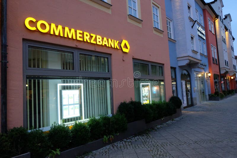 German Commerzbank bank at night with copy space to the right. German Commerzbank bank at night with copy space to the right